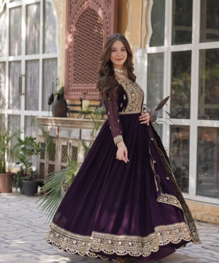 Women's Luxurious Plum Velvet Anarkali Gown with Heavy Gold Zari & Sequin Embroidery – Perfect for Weddings & Grand Festivities